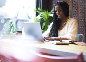 Cheerful,Young,Afro,American,Hipster,Girl,Having,Internet,Conversation,Through